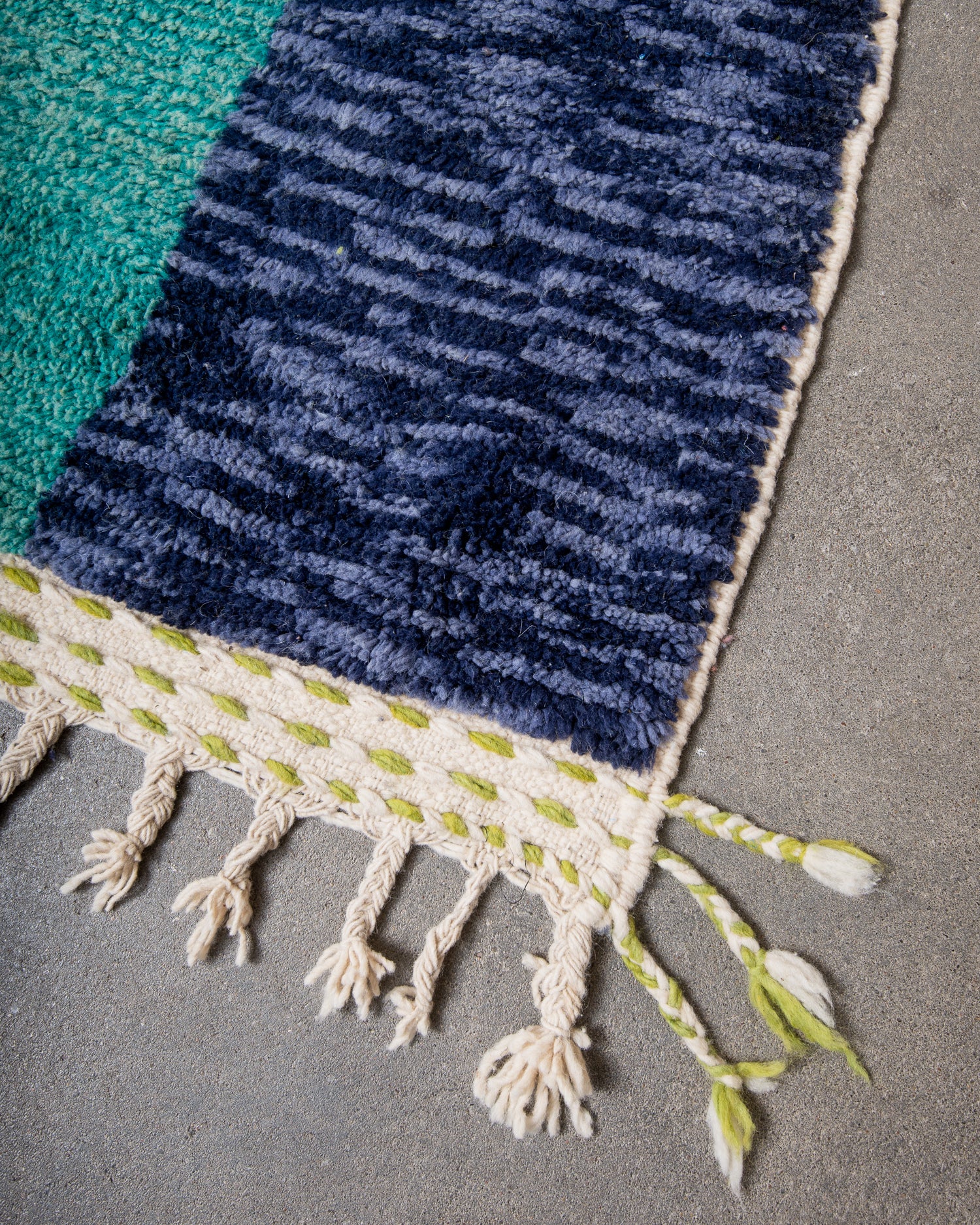 Modern, designer, handcrafted Berber rug from Morocco. Beniourain carpet with beautiful colours and patterns and fluffy wool texture.